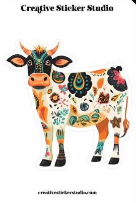 Colorful cow illustration on a white background with 'Creative Sticker Studio' branding.