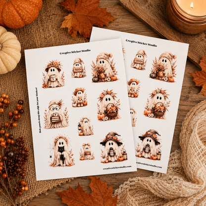 Two printed sticker sheets featuring cute ghost Halloween designs, styled on a rustic autumn-themed background with pumpkins, leaves, and a candle.